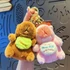 Kép 1/8 - Felhúzható mozgó szárnyú Capybara kulcstartó – barna / rózsaszín